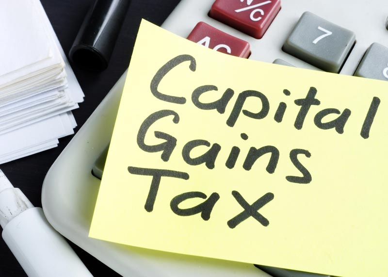 Capital Gains Tax written on a postit note